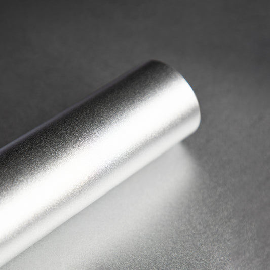 Roll of smooth silver wallpaper