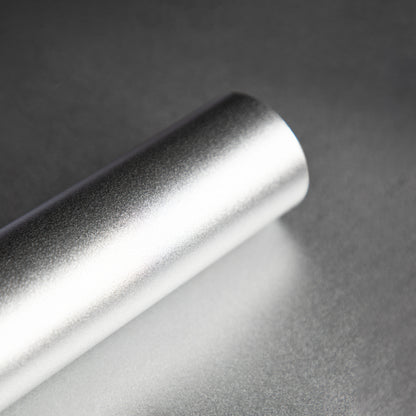 Roll of smooth silver wallpaper