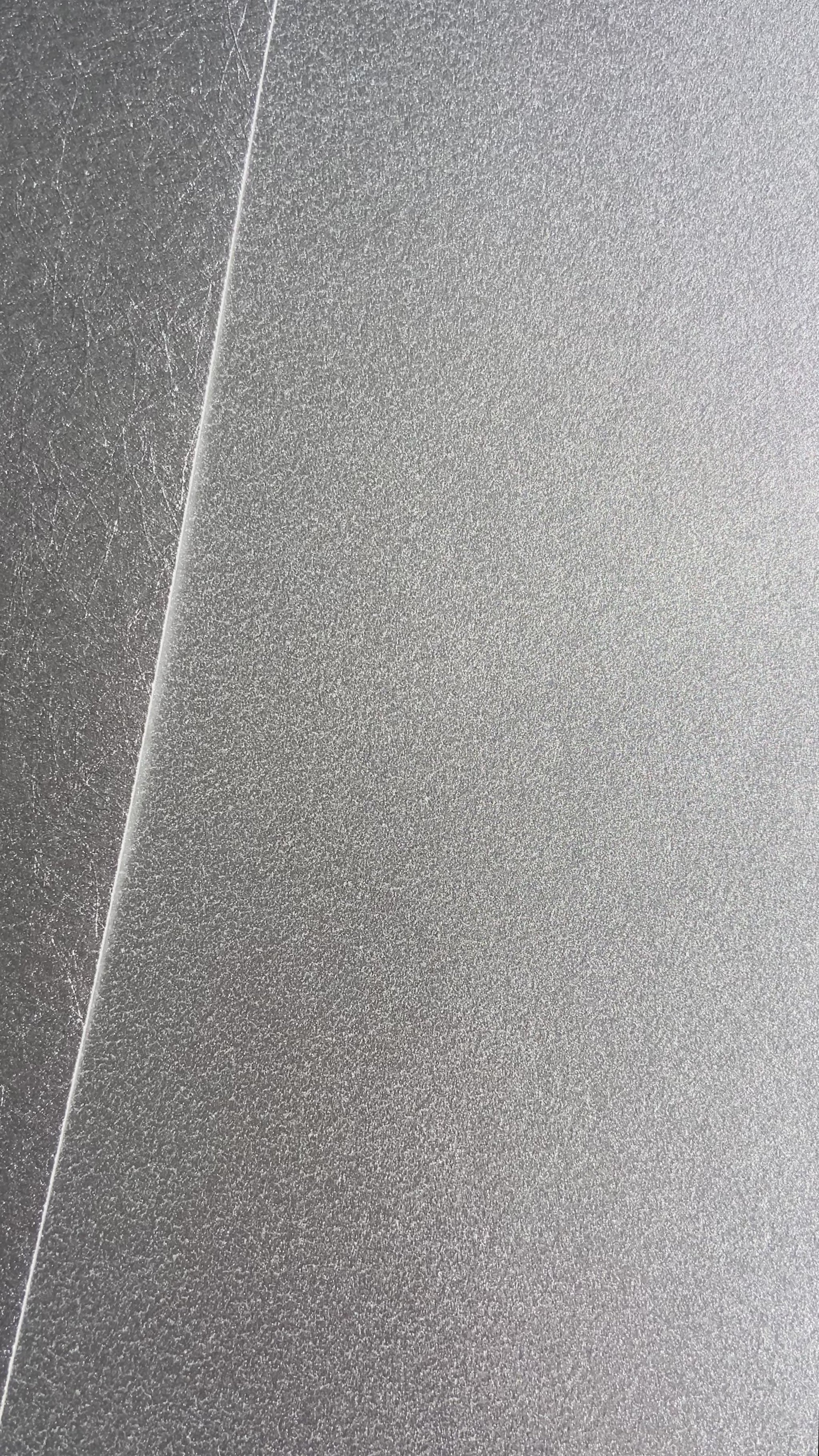 Short video showcasing both smooth & textured silver wallpaper